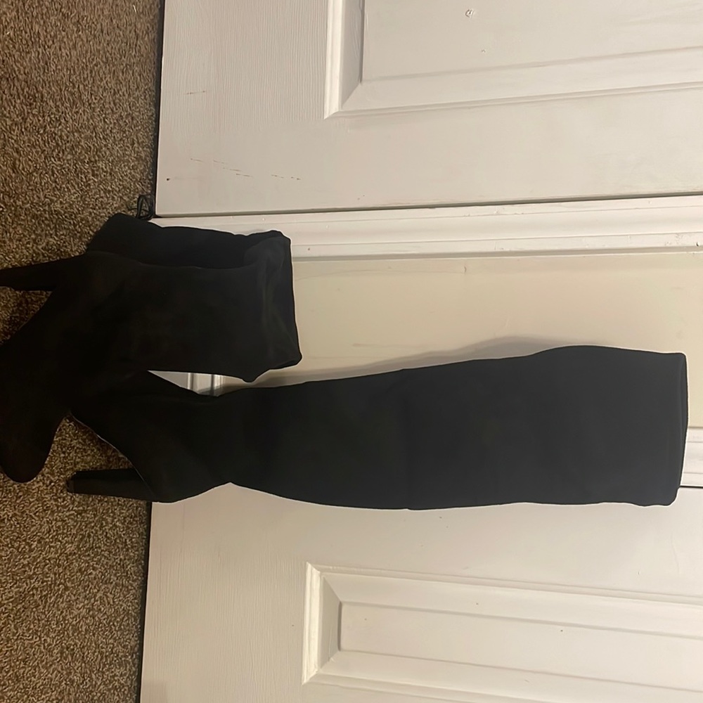 Black. Thigh high Charolette Russe Boots.
